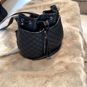 Steve Madden black quilted backpack/shoulder bag